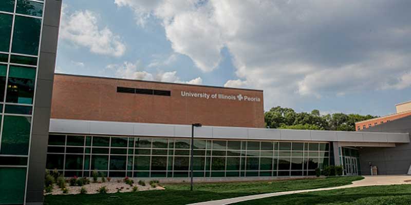 An exterior photograph of the Library of the Health Sciences, Peoria building.