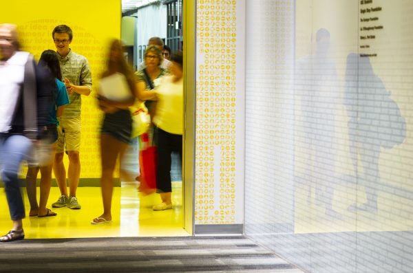 Patrons walking through the Library