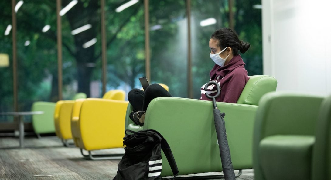 Student studying in the IDEA Commons.