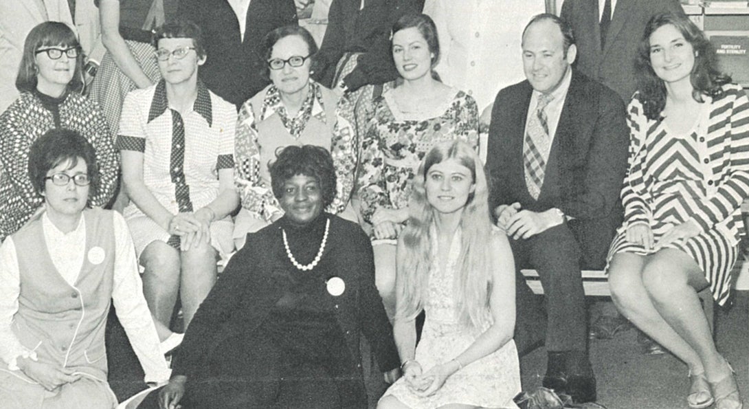 Photo from a Library of the Health Sciences newsletter, 1974. Beverly Allen (first row, center) with colleagues.